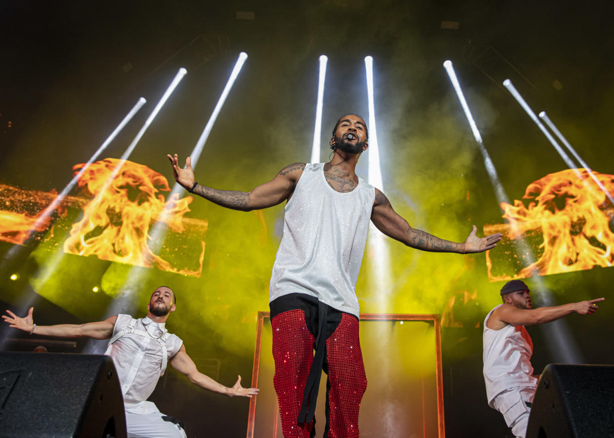 DETROIT, MICHIGAN - OCTOBER 10: Omarion performs during the Millennium Tour at Little Caesars Arena on October 10, 2021 in Detroit, Michigan. (Photo by Scott Legato/Getty Images)