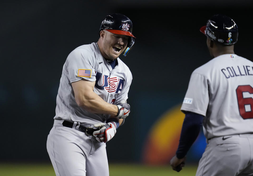 United States' Mike Trout celebrates after hitting a two-run single against Colombia during the fifth inning of a World Baseball Classic game in Phoenix, Wednesday, March 15, 2023. (AP Photo/Godofredo A. Vásquez)