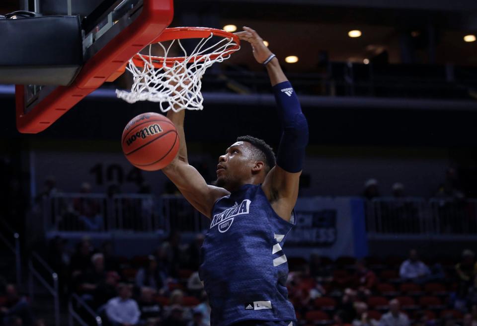 Nevada freshman Tre'Shawn Thurman dunks the ball during open practice on Wednesday, March 20, 2019, at Wells Fargo Arena in Des Moines, Iowa.