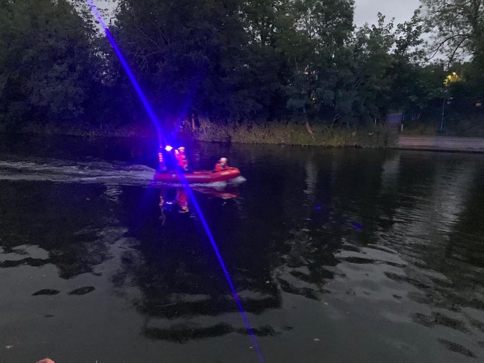 Rescue boats patrolling the river on Saturday. (SWNS)