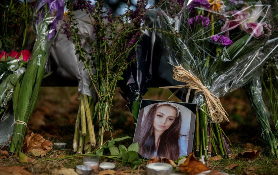 A photo of Sabina Nessa is seen amongst floral tributes and messages at Cator Park - Chris J Ratcliffe/Getty Images