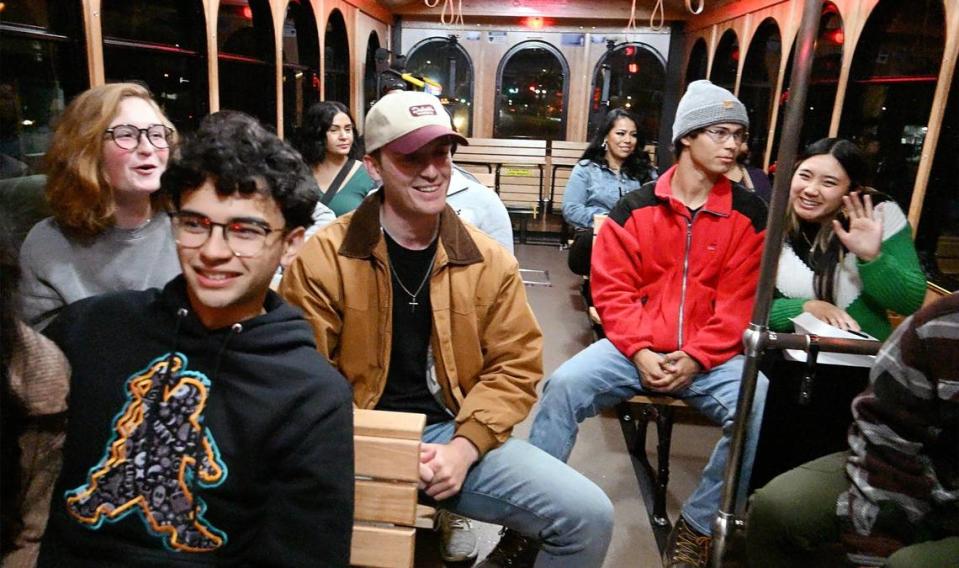 Passengers ride the City of Fresno’s new free FresnoHOP trolley service from Fresno State’s Campus Pointe to the Tower District and the Brewery District Friday night, Nov. 10, 2023 in Fresno.