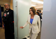 House Democratic Leader Nancy Pelosi (D-CA) enters a news conference on a visit to various immigration detention facilities, in San Diego, California, U.S. June 18, 2018. REUTERS/John Gastaldo