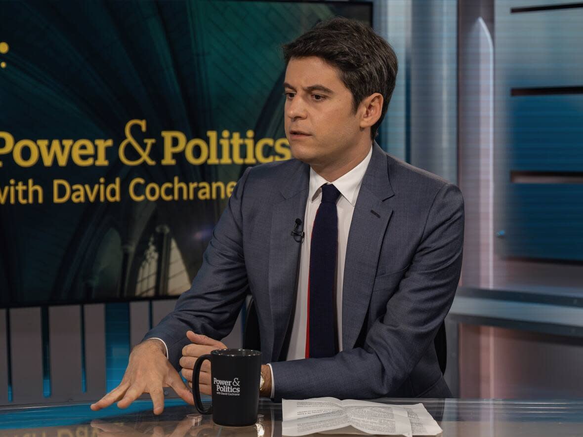 French Prime Minister Gabriel Attal sits down with Power and Politics host David Cochrane in Ottawa on Thursday, April 11, 2024. (Mathieu Theriault/CBC News - image credit)