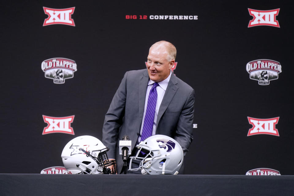 Kansas head coach Lance Leipold smiles before sitting down to speak to reporters at the NCAA college football Big 12 media days in Arlington, Texas, Wednesday, July 13, 2022. (AP Photo/LM Otero)