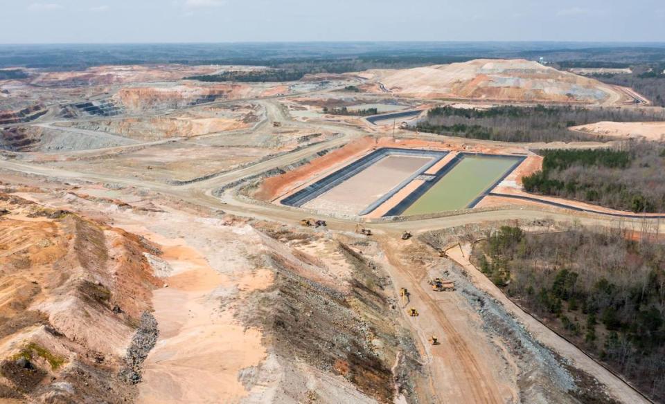 The Haile Gold Mine is an open-pit mining operation in Lancaster County, SC. This photo shows the scale of the project, which is comparable to some open pit gold and copper mines in the western United States. The site, owned by OceanaGold, is producing billions of dollars in gold.