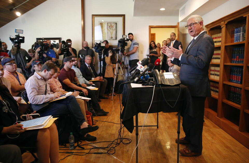 FILE - In this Oct. 3, 2018 file photo, attorney Leslie Stovall, right, speaks during a news conference about rape allegations against soccer star Cristiano Ronaldo in Las Vegas. Stovall represents Kathryn Mayorga, of Nevada, who is alleging Ronaldo raped her in Las Vegas in 2009. A Nevada woman's lawsuit claiming that Cristiano Ronaldo raped her nine years ago and paid her $375,000 in hush money has set in motion a two-track legal process that could put the fate of one of the world's most famous athletes in the hands of Nevada jurors who may or may not know about the soccer star's fame. Whether criminal charges are filed depends on the outcome of a police investigation reopened last month at the request of Kathryn Mayorga, a former model who alleges that Ronaldo attacked her in the bedroom of his penthouse at a Las Vegas hotel. (AP Photo/John Locher, File)