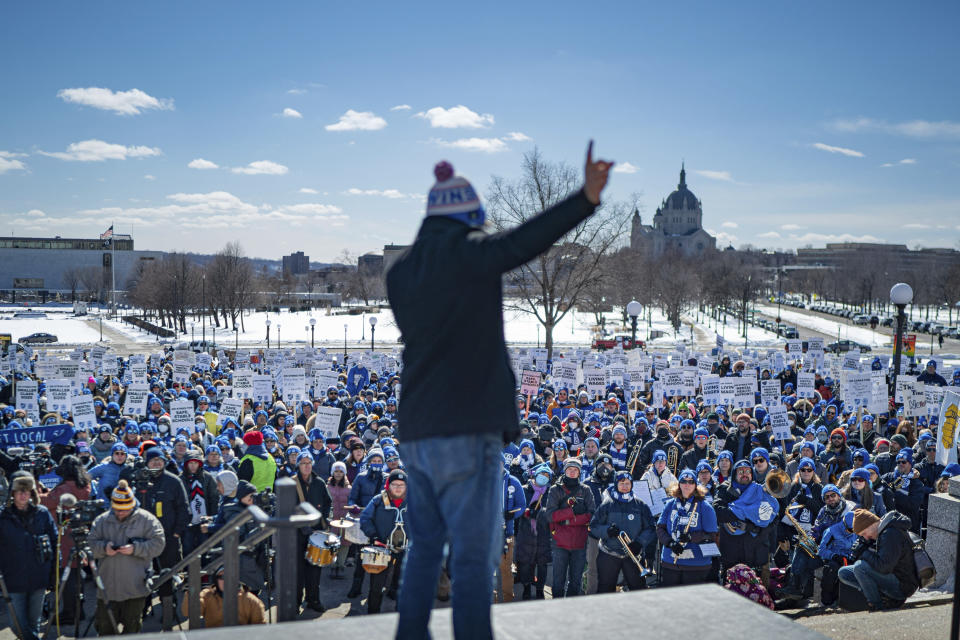 Shaun Laden, president ESP chapter of MFT addresses the crowd as Twin Cities teachers including MFT, Minneapolis Federation of Teachers Local 59, and ESP, Education Support Professionals, rallied at the Minnesota State Capitol, Wednesday, March 9, 2022 St. Paul, Minn. (Glen Stubbe/Star Tribune via AP)