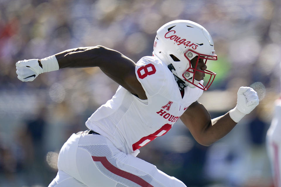 Houston wide receiver KeSean Carter runs a route against Navy during the first half of an NCAA college football game, Saturday, Oct. 22, 2022, in Annapolis, Md. (AP Photo/Julio Cortez)