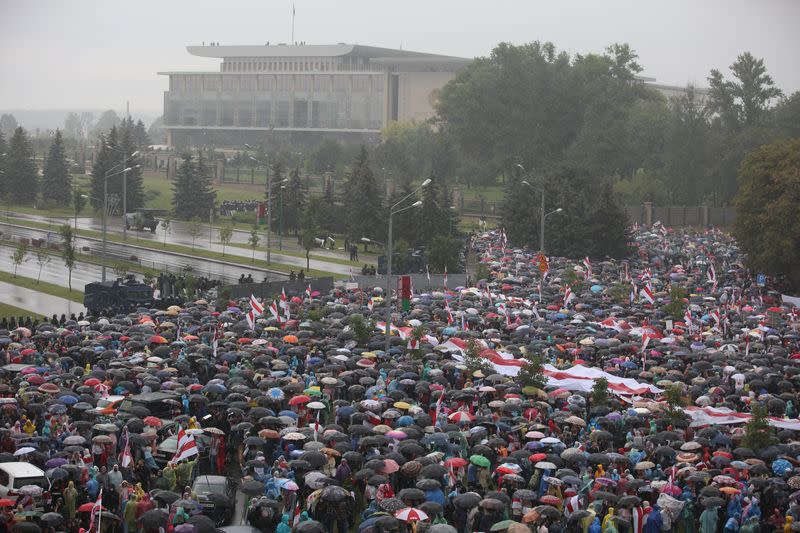 People attend an opposition rally to reject the presidential election results in Minsk