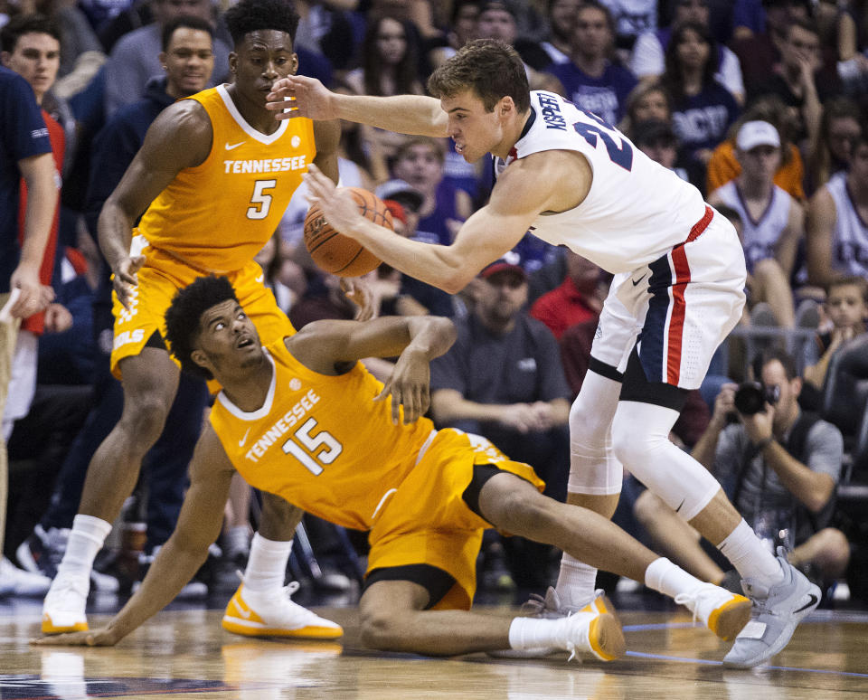 Tennessee's Derrick Walker (15) loses the ball against Gonzaga's Corey Kispect (24) as Tennessee's Admiral Schofield (5) looks on during the first half of an NCAA college basketball game Sunday, Dec. 9, 2018, in Phoenix. (AP Photo/Darryl Webb)