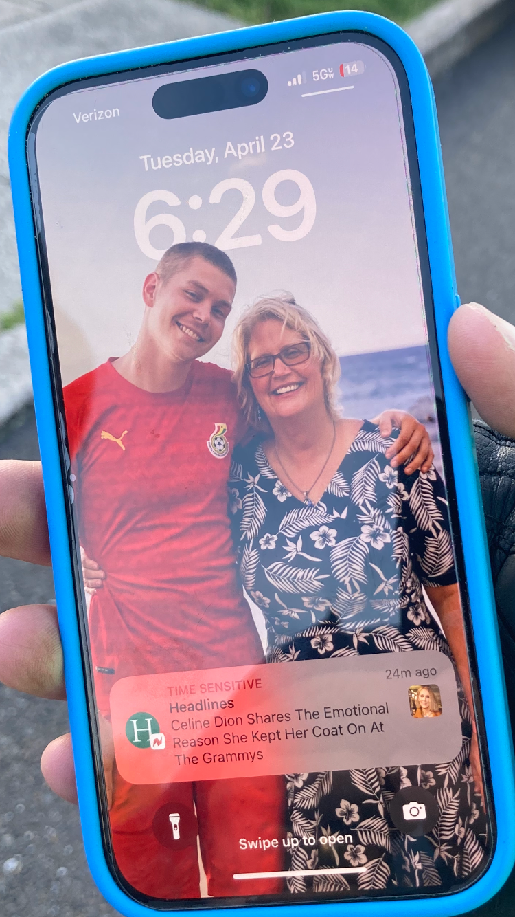 Debbie Curtis shows a picture of she and her son, Brock, who took his life at age 24 in January 2021. She rode 3,600 miles across the United States to bring awareness to the difficulties in getting loved ones suffering from mental illness help.