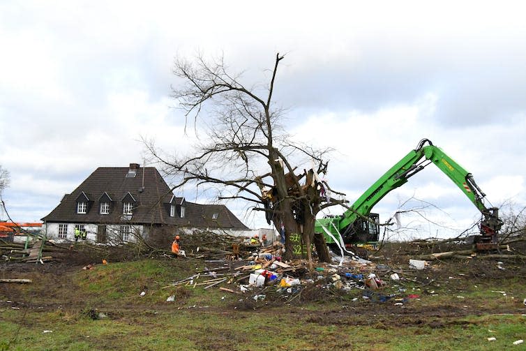 House, tree and digger