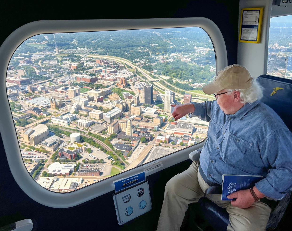 Akron historian Dave Lieberth points out details of the city from the Goodyear blimp on Tuesday, August 29, 2023 in Akron.