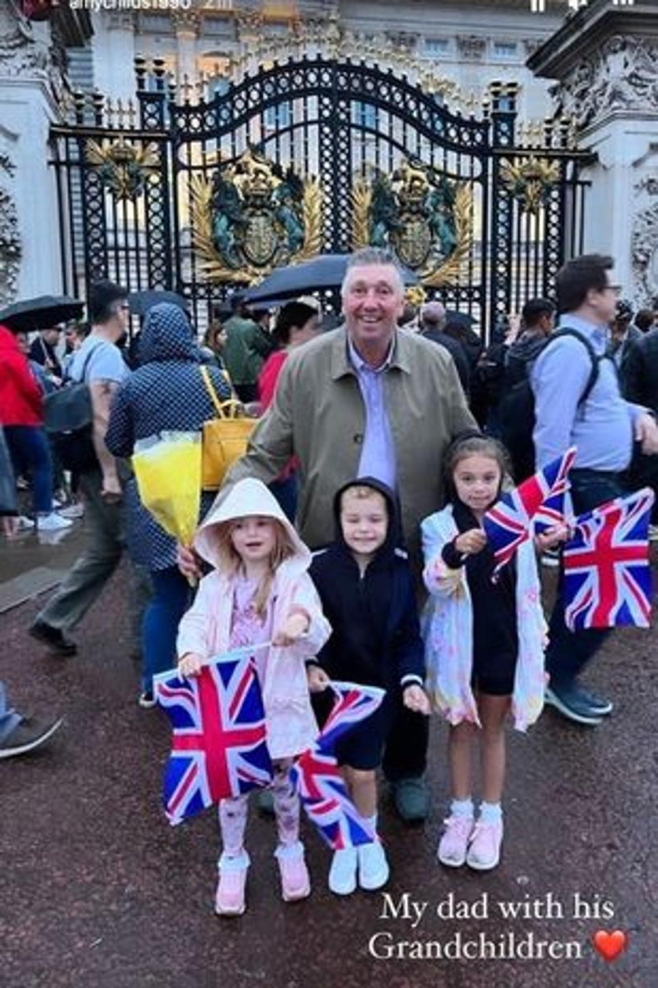 Amy Childs shared a picture of her dad posing with his grandchildren outside Buckingham Palace (Amy Childs)