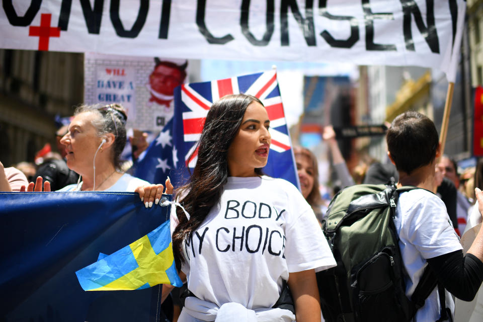 People participate in a 'The Worldwide Rally for Freedom' in Melbourne. Source: Getty