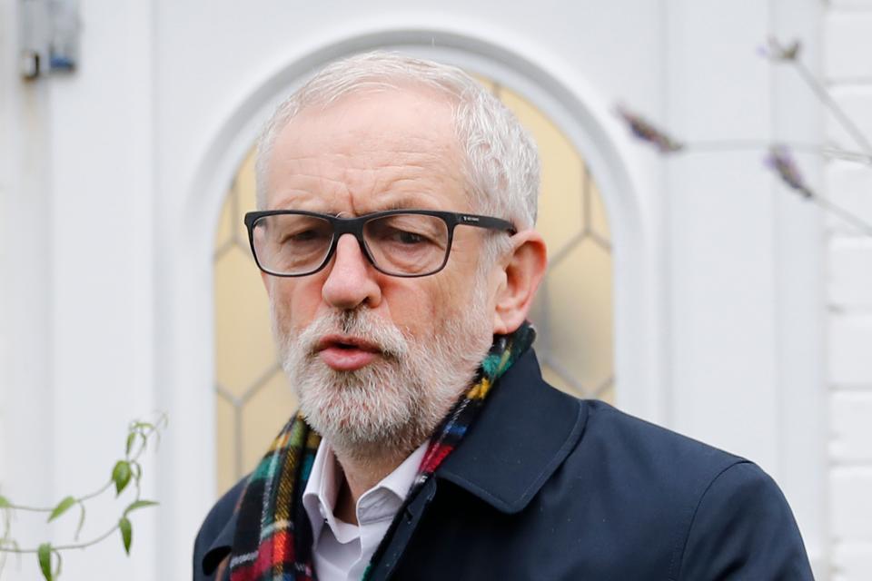 Britain's opposition Labour Party leader Jeremy Corbyn leaves his home in north London on  December 17, 2019 for the first full day of the new parliament following the general election. - Corbyn will face Prime Minister Boris Johnson in the House of Commons today after Labour was handed its worst defeat in a general election since World war II, forcing the Labour leader to announce a plan for his departure. He also faces a potentially uncomfortable meeting with his own Labour colleagues later in the day. (Photo by Tolga AKMEN / AFP) (Photo by TOLGA AKMEN/AFP via Getty Images)