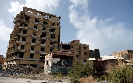 A view of buildings destroyed by the war, near the old popular market known as the Souk al-Jureid, in Benghazi, Libya February 7, 2019. REUTERS/Esam Omran Al-Fetori