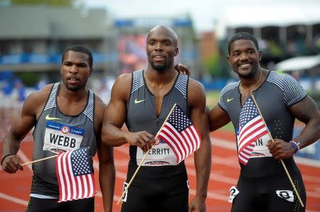 Jul 9, 2016; Eugene, OR, USA; Ameer Webb (left) and LaShawn Merritt (middle) and Justin Gatlin (right) react after competing during the men's 200m final in the 2016 U.S. Olympic track and field team trials at Hayward Field. Mandatory Credit: Glenn Andrews-USA TODAY Sports