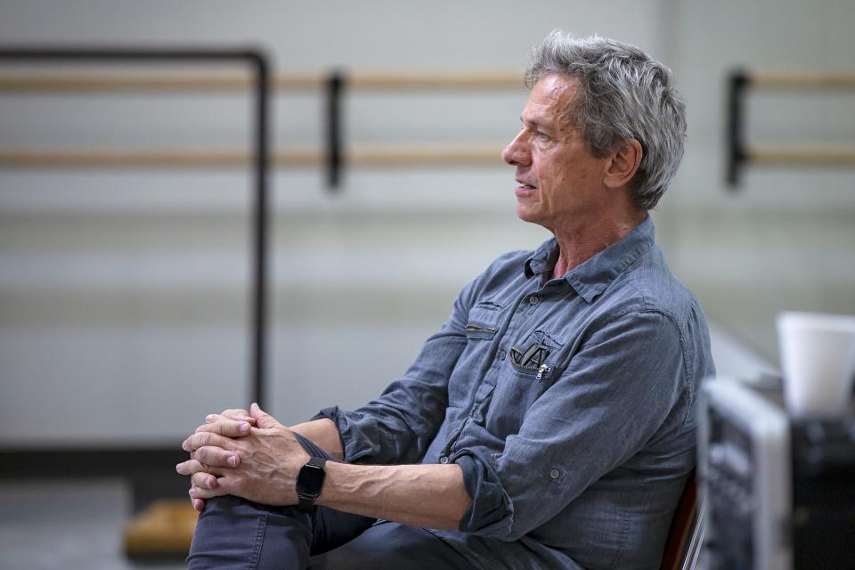 Artistic director Ib Andersen watches dancers rehearse in one of the Ballet Arizona studios in Phoenix on April 29, 2022.