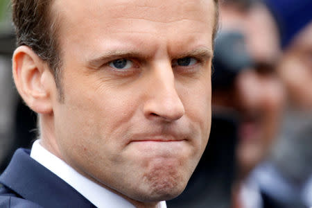 FILE PHOTO: French President Emmanuel Macron attends a ceremony at the Arc de Triomphe in Paris, France, June 3, 2017. REUTERS/Charles Platiau/File Photo