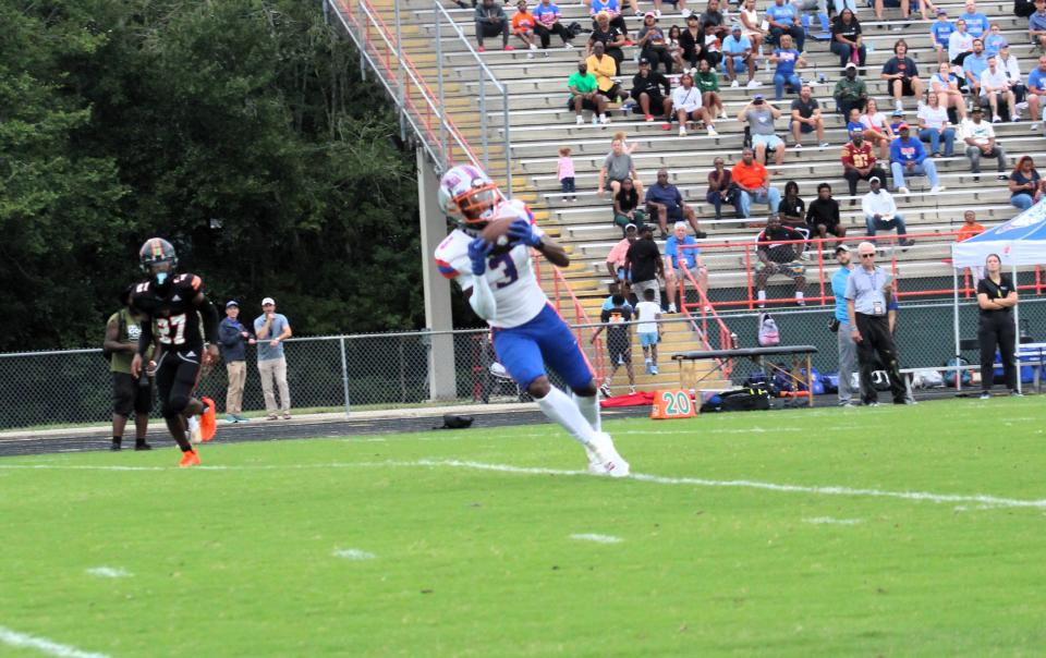 Bolles wide receiver Naeem Burroughs picks up a first down.