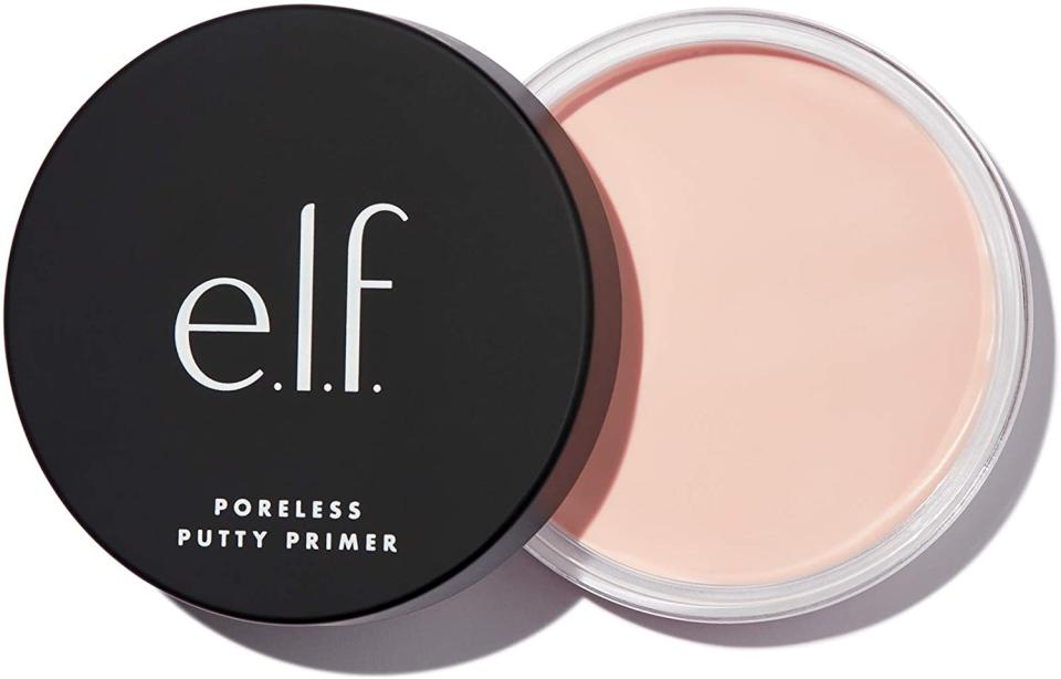 A black lid with white lettering and an open white tub of pink e.l.f. Poreless Putty Primer, $31.96