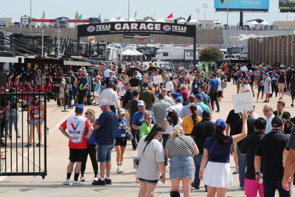 Sep 24, 2023; Fort Worth, Texas, USA; A general view of fans in the garage area before the NASCAR Cup Series AutoTrader EcoPark Automotive 400 at Texas Motor Speedway. Mandatory Credit: Michael C. Johnson-USA TODAY Sports