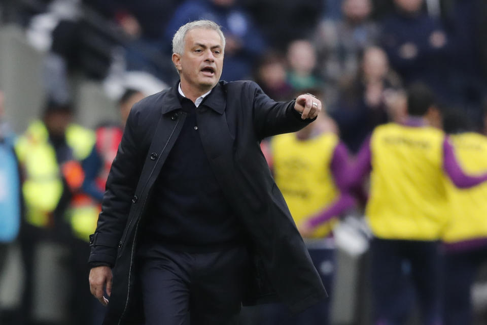 Tottenham's manager Jose Mourinho calls out to his players during the English Premier League soccer match between West Ham and Tottenham, at London stadium, in London, Saturday, Nov. 23, 2019.(AP Photo/Frank Augstein)