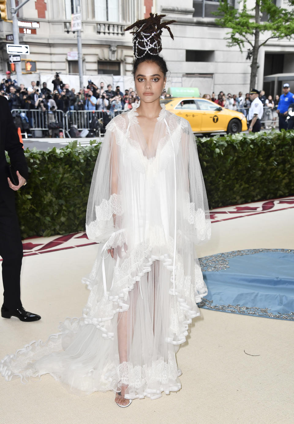 <p>Sasha Lane could easily skip from the red carpet straight into bed in this white bedgown-inspired look by Tory Burch. Photo: Getty Images </p>