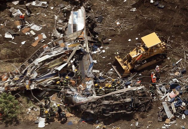 Investigators and first responders work near the wreckage of Amtrak 188 on May 13, 2015, in Philadelphia. (Photo: Win McNamee via Getty Images)