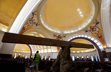 An army soldier works at the new Coptic Cathedral of the Nativity in the New Administrative Capital (NAC) east of Cairo, Egypt January 3, 2019. Picture taken January 3, 2019. REUTERS/Amr Abdallah Dalsh