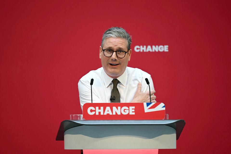 TOPSHOT - Britain's main opposition Labour Party leader Keir Starmer delivers a speech on stage during the launching of Labour Party election manifesto, in Manchester, on June 13, 2024 in the build-up to the UK general election on July 4. (Photo by Oli SCARFF / AFP) (Photo by OLI SCARFF/AFP via Getty Images)