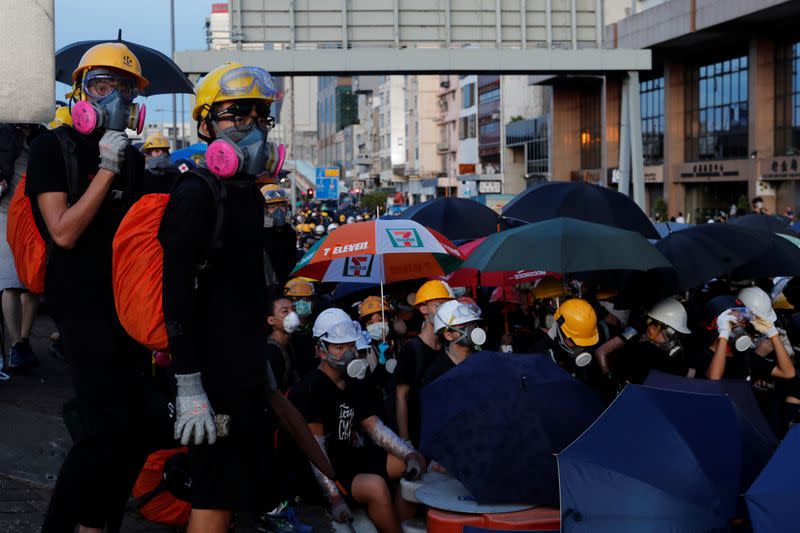 The Wider Image: On trial on riot charges, Hong Kong newlyweds prepared for life apart