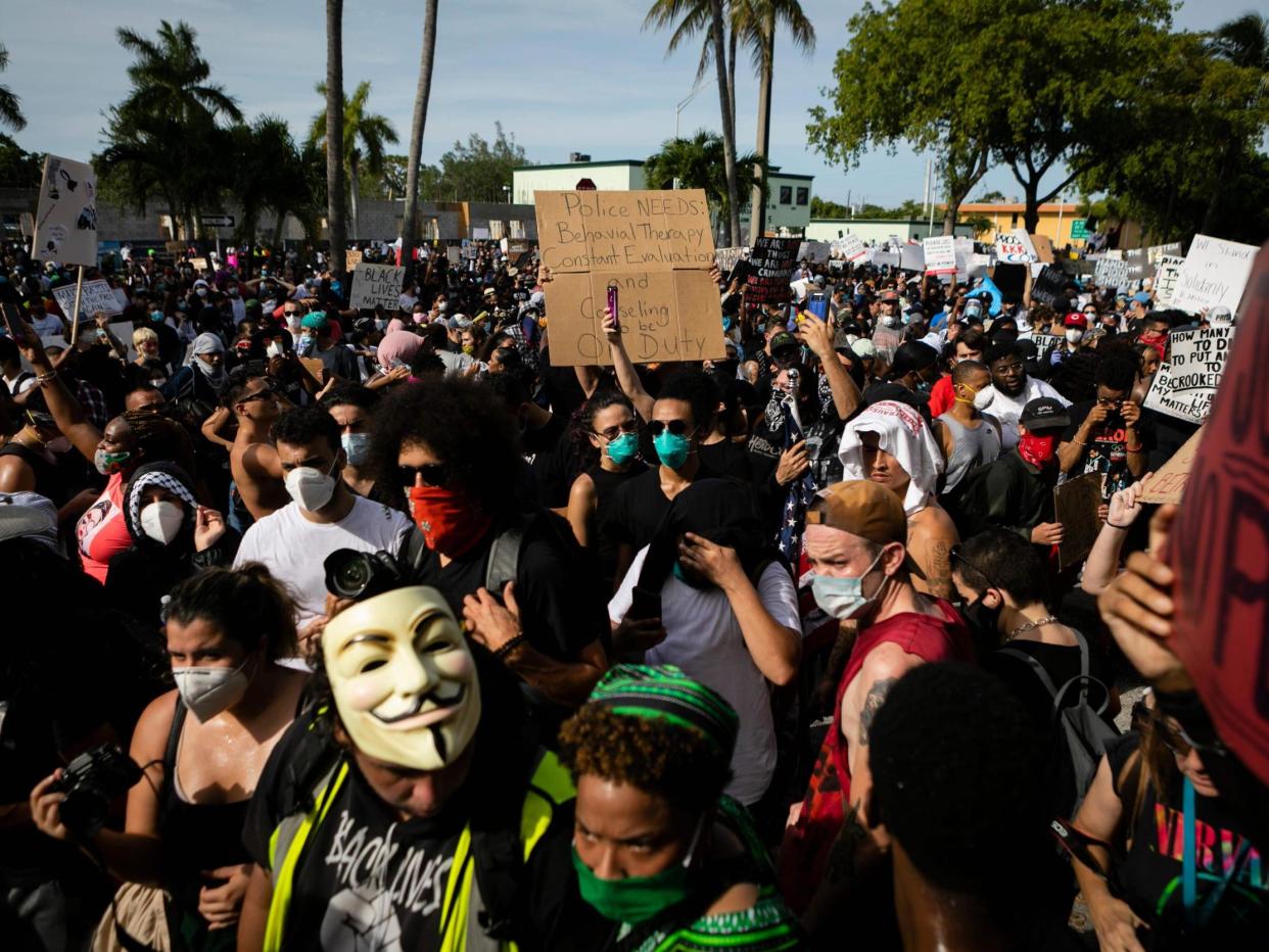 Protesters gather at Fort Lauderdale Police Department during a rally in response to the recent death of George Floyd: (AFP)