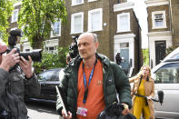 Britain's Prime Minister Boris Johnson's senior aid Dominic Cummings leaves his home, in London, Sunday, May 24, 2020. Several lawmakers from Britain’s governing Conservative Party have joined opposition calls for Johnson’s top aide to be fired for flouting lockdown rules. Dominic Cummings traveled 250 miles (400 kms) to his parents’ home with his wife and son as he was coming down with COVID-19 at the end of March. (AP Photo/Alberto Pezzali)
