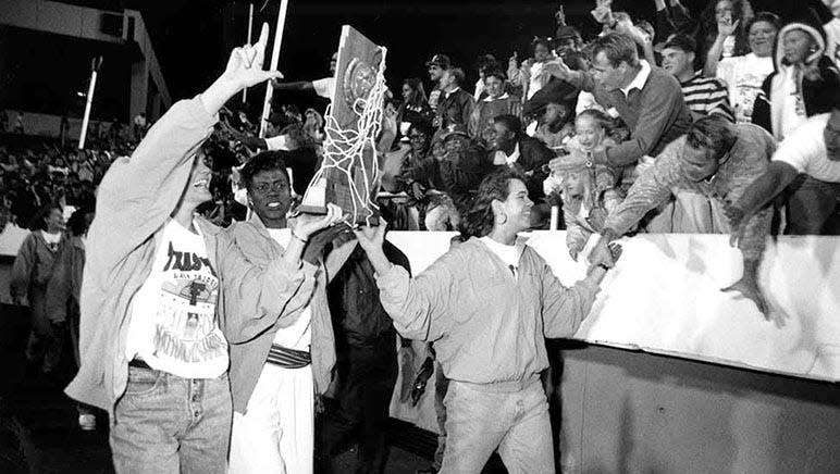 Members of the Texas Tech Lady Raiders women's basketball team celebrate after winning the NCAA national championship in 1993.