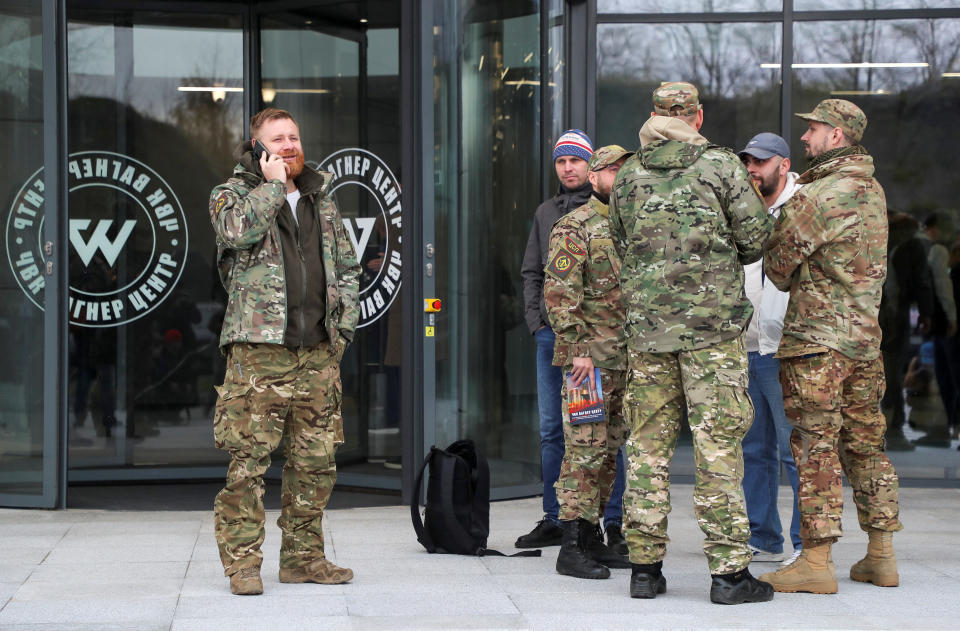 Visitors gather outside PMC Wagner Centre, which is a project implemented by the businessman and founder of the Wagner private military group Yevgeny Prigozhin, during the official opening of the office block in Saint Petersburg, Russia, November 4, 2022. REUTERS/Igor Russak