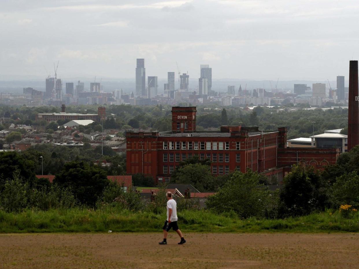 A man exercises amid the local lockdown in Oldham, which has seen a spike in infections: REUTERS