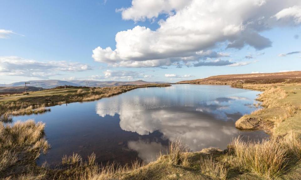 Blue sky and cloud reflections in Keeper’s Pond