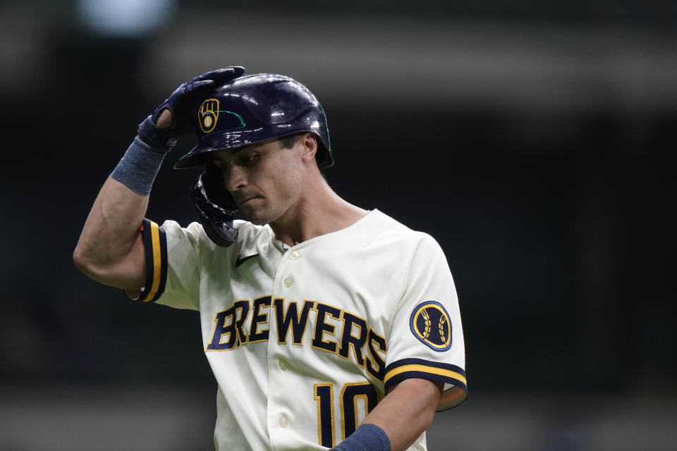 Milwaukee Brewers' Sal Frelick walks back to the dugout after flying out during the ninth inning of a baseball game against the Miami Marlins Wednesday, Sept. 13, 2023, in Milwaukee. (AP Photo/Aaron Gash)