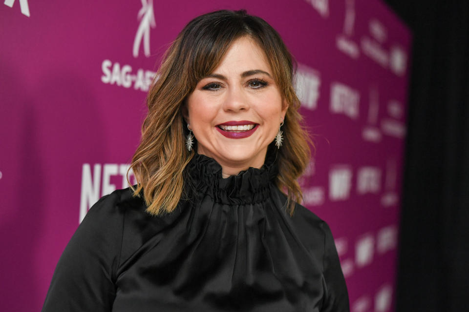 Mandy Teefey on a purple step and repeat at the 'Rebels and Rule Breakers' FYC event