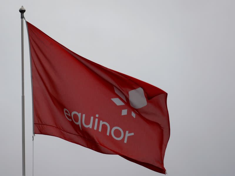 FILE PHOTO: Equinor's flag flutters next to the company's headqurters in Stavanger