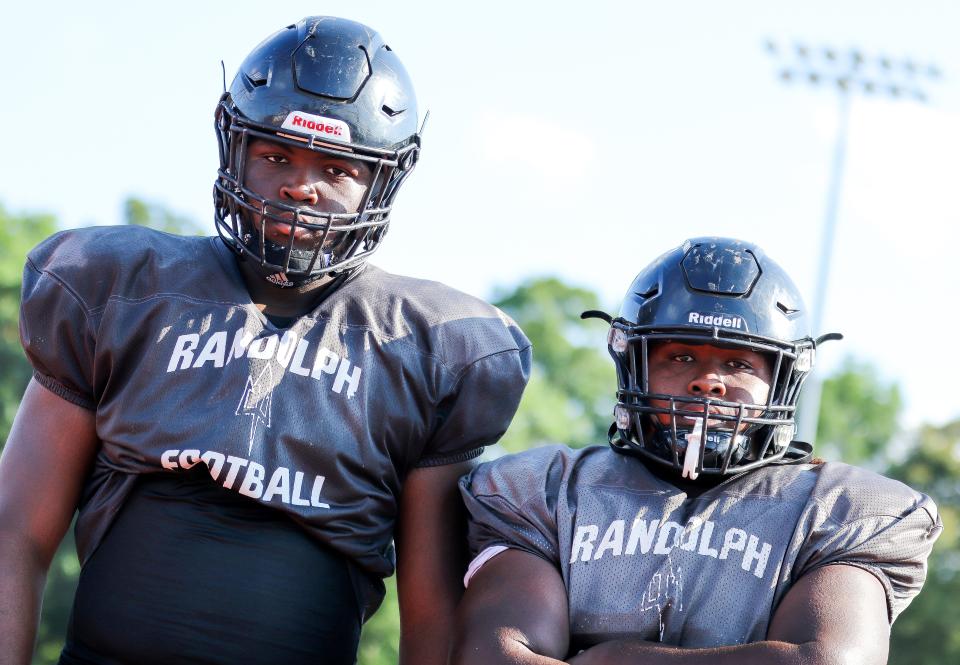 From left, Randolph's Chris Paul and Edmond McKenzie pose during a football practice on Monday, August 29, 2022.