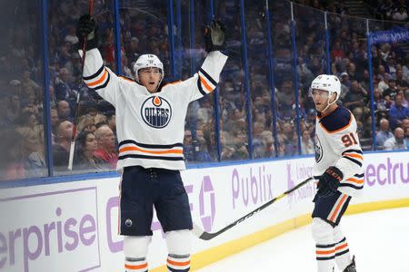 Nov 6, 2018; Tampa, FL, USA;Edmonton Oilers center Ryan Strome (18) is congratulated by left wing Drake Caggiula (91) as he scores a goal against the Tampa Bay Lightning during the second period at Amalie Arena. Mandatory Credit: Kim Klement-USA TODAY Sports