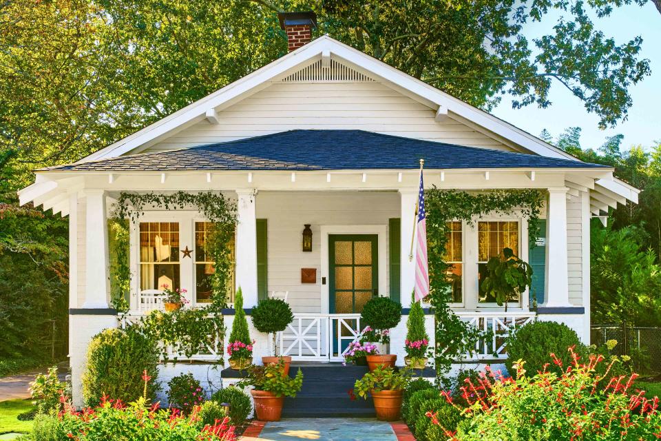 <p>JAMES RANSOM; STYLING: Veronica Olson</p> Like the interiors, the front yard tells a story with roadside-rescue boxwoods and flowers inspired by Hendersonâ€™s childhood garden.