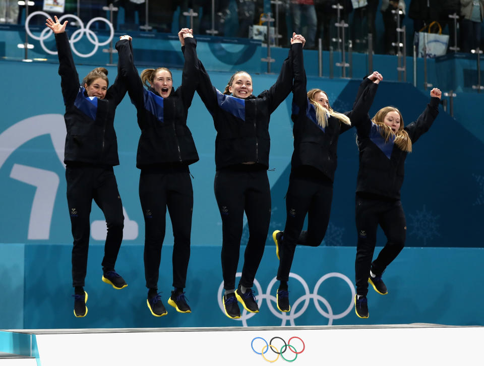 <p>Winners of the gold medal, Jennie Waahlin, Sofia Mabergs, Agnes Knochenhauer, Sara McManus and Anna Hasselborg of Sweden celebrate on the podium following the Women’s Gold Medal Game between Sweden and Korea on day sixteen of the PyeongChang 2018 Winter Olympic Games at Gangneung Curling Centre on February 25, 2018 in Gangneung, South Korea. (Photo by Ronald Martinez/Getty Images) </p>
