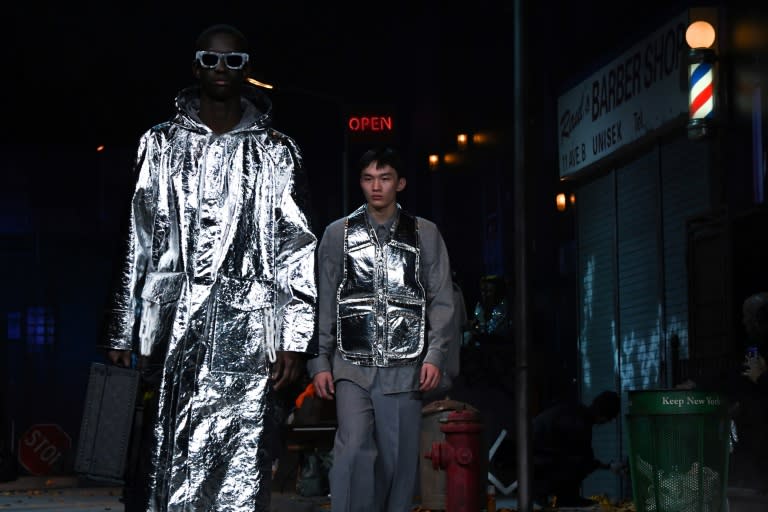 Virgil Abloh's show made reference to Iron Man, in the guise of a hooded aluminium foil knee-length coat worn with similarly reflective sunglasses