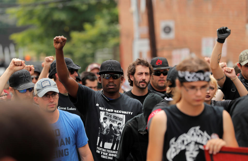 <p>A group wearing antifa paraphernalia march ahead of the one year anniversary of 2017 Charlottesville “Unite the Right” protests in Charlottesville, Va., Aug. 11, 2018. (Photo: Lucas Jackson/Reuters) </p>