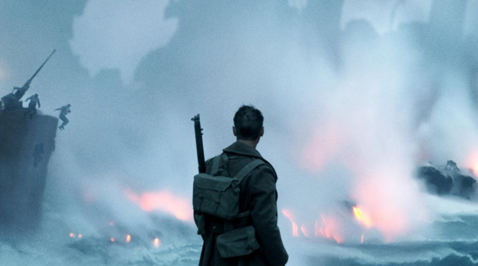 A soldier (we believe it may be Tom Hardy) against a devastating backdrop. (Credit: Warner Bros) 